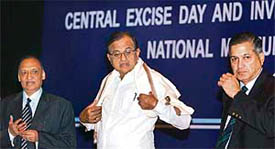 Finance minister P.Chidambaram flanked by revenue secretary P.V. Bhide (R), and S.K.  Shingal, chairman, Central Board of Excise and Customs (CBEC), at the Annual Investiture Ceremony of the CBEC in New Delhi on Sunday.