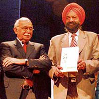 Tarlochan Singh, MP, releases the book “Giani Gurdit Singh 1923-2007” at Punjab Kala Bhavan in Chandigarh on Sunday, while Prof B.N. Goswamy looks on.
