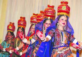 Girls performing during a talent hunt show at University of Jammu