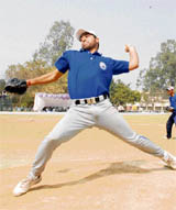 Vishal Sharma of Chandigarh in action during the baseball national at Sector-23, Chandigarh, on Monday.