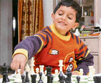 Chess prodigy Anubhav Tuknayat makes a move.