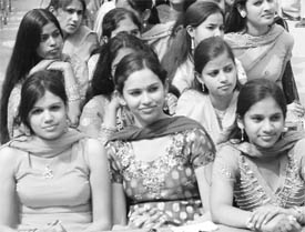 Girls attend a farewell party at Veer Haqueeqat Rai School in Patiala on Monday.