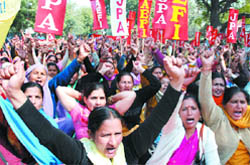 Anganwadi workers protest against governments move to introduce public-private partnership in the intergrated child development scheme, at Jantar Mantar in the Capital