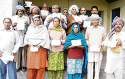 Depositors with their passbooks at Nurpur