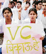 Medicos stage a protest on the MDU campus on Tuesday against alleged irregularities in the MD/MS/MDS entrance examination