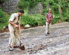 Patches on the Gaggal-Skoh-Dsala road being filled.
