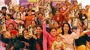 Awarded students of B.Ed colleges cheering at Dasmesh Girls College of Education in Badal village on Wednesday.