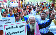 members of the Siksha Sanskriti Utthan Nyas (right) shout slogans against the book Culture in Ancient India at Jantar Mantar in the Capital
