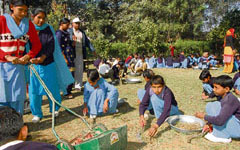 Students of a government school in Jhajjar district beautify the school premises.