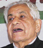 Samajwadi Party state president Sheikh Abdul Rehman addresses a news conference in Srinagar on Thursday.