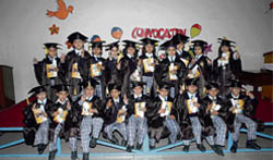 Tiny tots of Om Parkash Bansal Modern School show victory sign after receving degrees during a convocation function in Mandi Gobindgarh