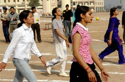 Girls participate in spoon race during the athletics meet of Swami Vivekanand Institute of Engineering and Technology in Banur