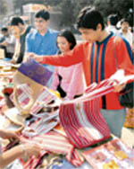 Students of Panjab University buy hanmade products created by children of local NGOs Chhoti Si Aasha and Sadhana at Students Centre of Panjab University in Chandigarh
