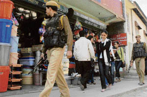 Soldiers from the paramilitary forces patrol the streets of Kohima on Friday ahead of Nagaland Assembly elections. Elections are scheduled to take place on March 5 with some 1.3 million voters set to determine the future of 218 candidates contesting 60 seats.