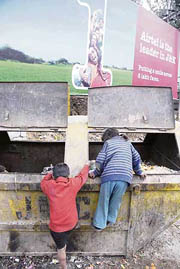 Street kids, better say children of a lesser god, playing near a garbage dump near Gurmat Chowk in Jammu on Saturday. Garbage from the dump has not been cleared for days because the municipal corporation is busy in an issue more important than cleanliness-mayor and deputy mayors elections. 