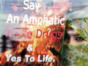 A woman holds a placard against drugs in Srinagar on Saturday.