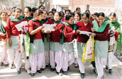 Students of Class VIII discuss the paper after appearing for their first board exam in Ludhiana