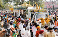 Devotees at Guru Manyo Granth Jagriti Yatra at Sector 22, Chandigarh, on Sunday.