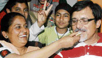 Parents of Siddarth Kaul celebrate the victory of Indian colts at their house in Sector 44, Chandigarh, on Sunday.