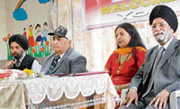 P.H. Vaishnav (middle) and S.S. Lamba (extreme right) at the inaugural function in Chandigarh on Sunday.