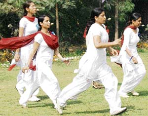 Girls take part in spoon race during the annual sports meet of Partap College of Education, Ludhiana, on Sunday. 