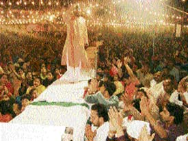 Harvinder Singh Romy, a devotional singer, recites a bhajan at a jagran at MGMN Senior Secondary School Ahmedgarh on Saturday night.