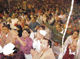 Listeners in a devotional mood at the jagran.