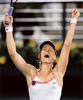 Elena Dementieva of Russia is ecstatic after beating compatriot Svetlana Kuznetsova in the final of the Dubai Tennis Championships on Saturday. Dementieva won 4-6, 6-3, 6-2. 