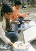Students participate in an on-the-spot painting competition during Jhankaar at the PU