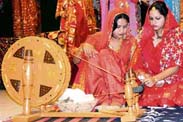 Girls spin a charkha