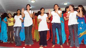 Students of Guru Nanak Girls College dance during a farewell party organised in Ludhiana on Monday. 