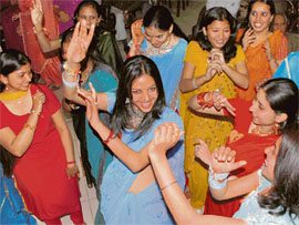 Students of DAV College dance at their farewell party in their college on Tuesday.