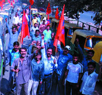 Auto, taxi, tempo drivers demonstrate at Raj Ghat in the Capital on Tuesday.