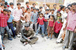 An ASI of the Haryana police who was beaten up by residents after he allegedly trespassed into a house at Hansi