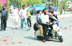Apart from manhandling commuters, the miscreants also damaged vehicles and public property