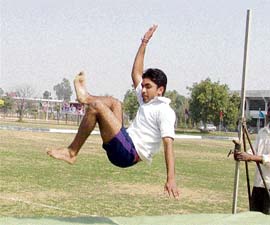 A participant in action during the annual athletics meet of Guru Angad Dev Veterinary and Animal Sciences University, Ludhiana