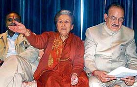 CLP leader Vidya Stokes (centre), Thakur Kaul Singh ( right) and Gangu Ram Musafir protest the bus fare hike during a prss conference held at the Vidhan Sabha in Shimla