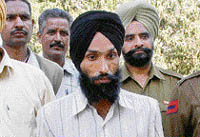Hoshiar Singh, an accused in the case of the attack on the Dera Sacha Sauda chief, in police custody in Karnal on Wednesday.