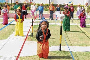 Kids of Chanda Mama School take part in games in Ludhiana on Wednesday.