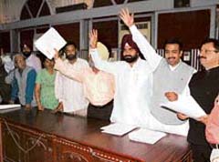 Councillors protest against the passing of the budget without discussion in the Amritsar Corporation House on Wednesday. 