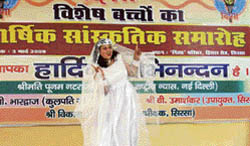 A special child presents an item during the annual function of Disha, an institute for special children, in Sirsa