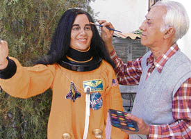 Chander Shakher Prabhakar gives final touches to Kalpana Chawlas wax statue in Ludhiana on Thursday.