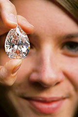 A 72.22 carat D-colour pear-shaped flawless diamond is displayed at Sotheby's auction house in London, on Friday.