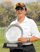 Pauline J.M. Singh is all smiles as she lifts the Grewal Salver Trophy after winning the title in the Chandigarh Ladies Golf Championship at the Chandigarh Golf Club on Friday.