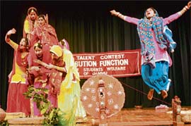 Students perform during a prize distribution function of talent hunt at the Gen Zorawar Singh Auditorium at the University of Jammu on Friday. 