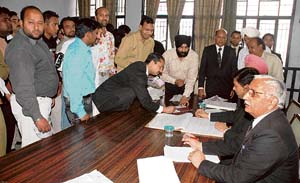 District and Sessions Judge G.K. Rai inspects the traffic lok adalat bench headed by Judicial Magistrate Jagdeep Sood in Ludhiana on Friday. 
