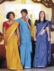 Top womens tennis players (from left) Serena Williams, Venus Williams and Jelena Jankovic are virtually unrecognisable in this traditional Indian attire during a function in Bangalore