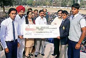 Siddharth Kaul, member of the under-19 Indian cricket team that won the World Cup recently, being honoured at GMSSS-35