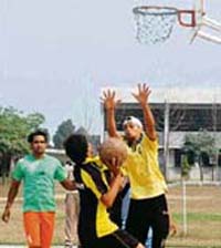 A basketball match in progress on the concluding day of the National Worker Sports Game at Punjab Agricultural University in Ludhiana. 