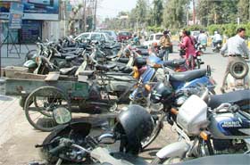 Majority of pavements on citys commercial roads are being used as parking lots